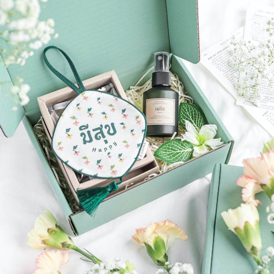 One-Sake.com gift set with lucky scent sachet and room spray in a green box with floral accents