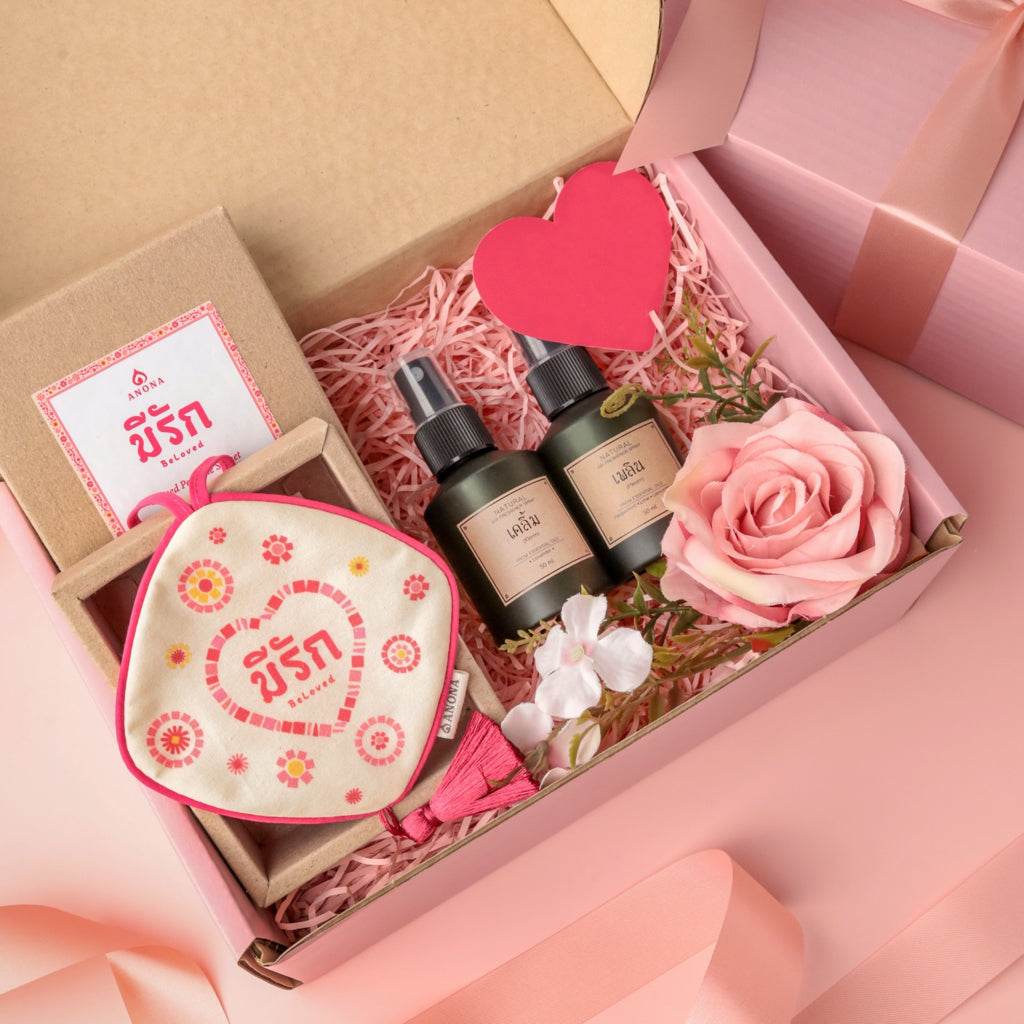 Natural room spray for couples gift set with two spray bottles, floral decor, and a pink rose in a gift box