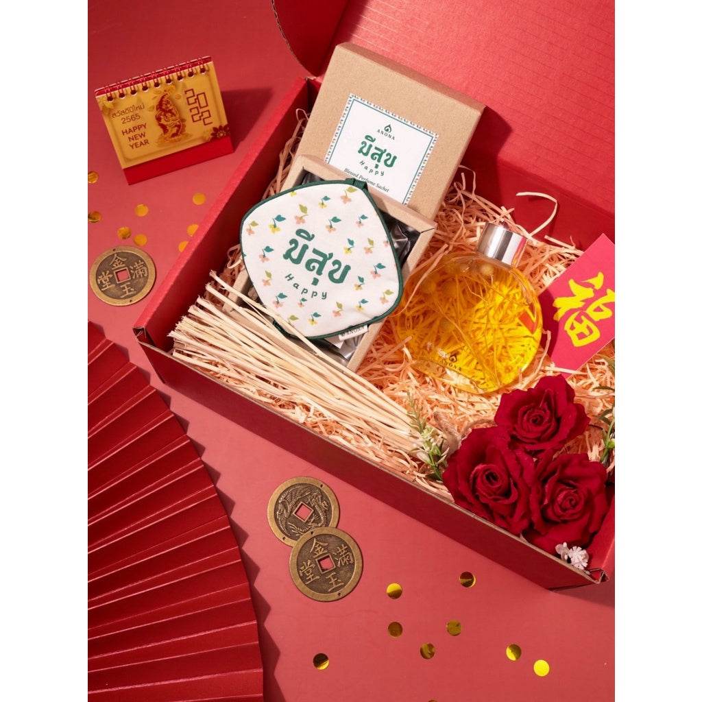 One-Sake.com premium aromatherapy gift box with aromatic oil, decorative roses, and scented candle in a red gift package