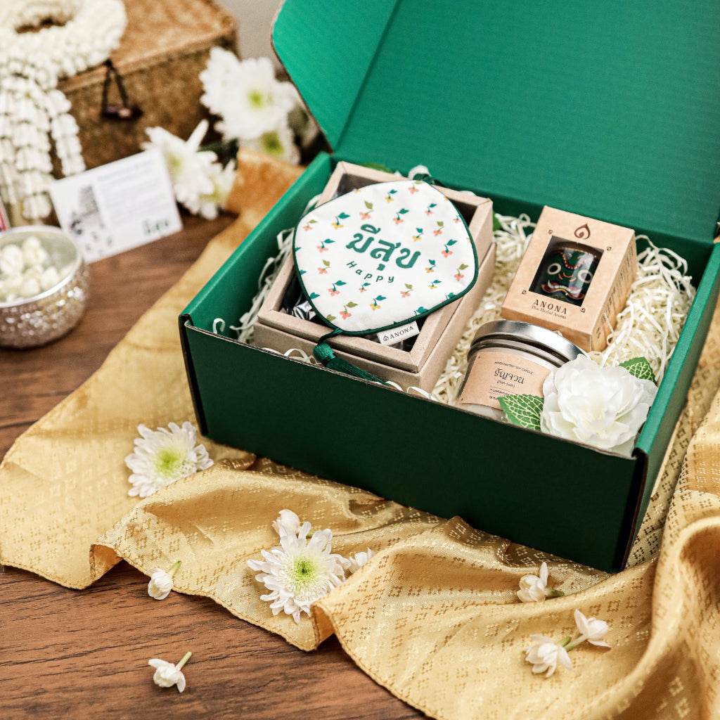 Premium Thai aromatherapy gifts set from One-Sake.com in green box with natural floral accents