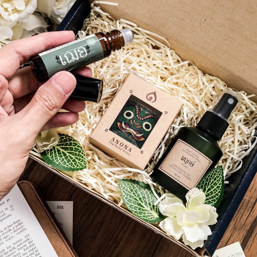 Premium Thai gift box for adults with essential oil roller, herbal soap, and spray bottle in decorative packaging