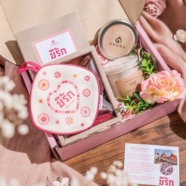 Romantic wedding gift set with scented candle, floral pouch, and herbal aroma oil in a pink box by One-Sake.com