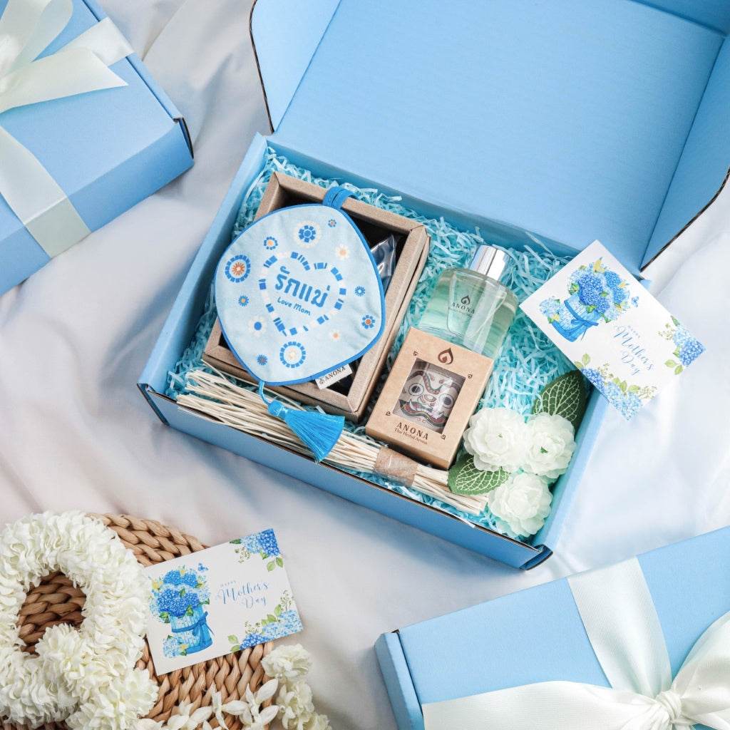 Gift box from One-Sake.com featuring Thai reed diffuser and room mist with decorative floral accents