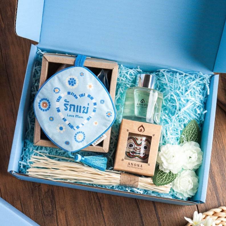 Thai reed diffuser and room mist gift set with floral sachet and decorative flowers in blue box