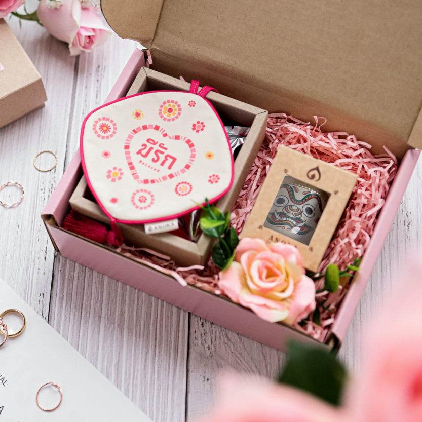 One-Sake.com unique Thai gift box with scented candle and decorative flower in pink packaging