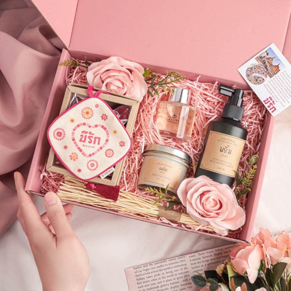 Valentine's Day soy candle collection gift set with scented candle, diffuser, and decorative flowers in pink box