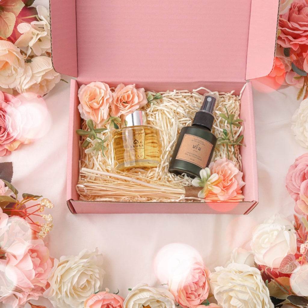 Wedding aromatherapy gift set with oils and spray in pink box accented with flowers