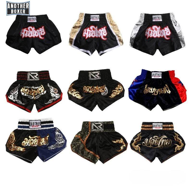 Nine assorted embroidered satin Muay Thai boxing shorts unisex display in various colors and gold silver designs
