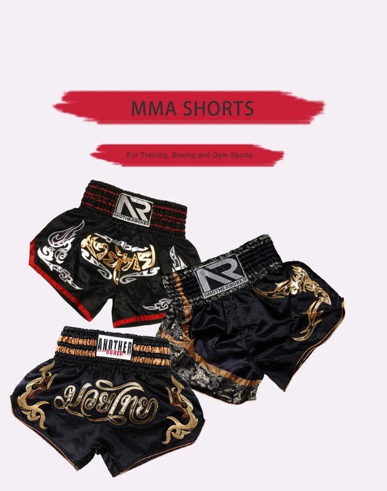 Three black Muay Thai boxing shorts unisex with gold Thai motifs elastic waistbands and contrast trim