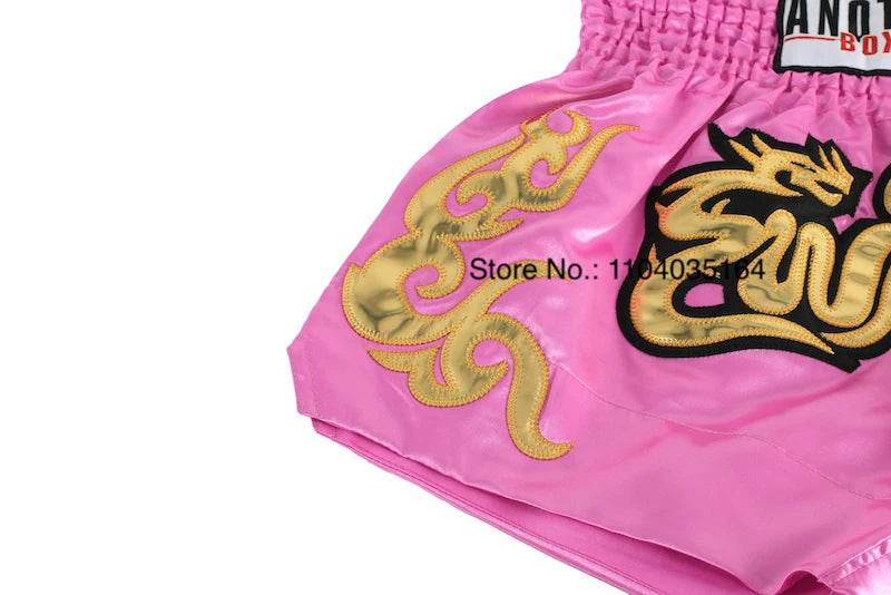 Pink satin kickboxing trunks for men and women with gold dragon embroidery and elastic waistband