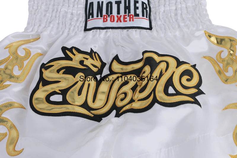 White satin kickboxing trunks with gold dragon embroidery and elastic smocked waistband satin kickboxing trunks for men and women
