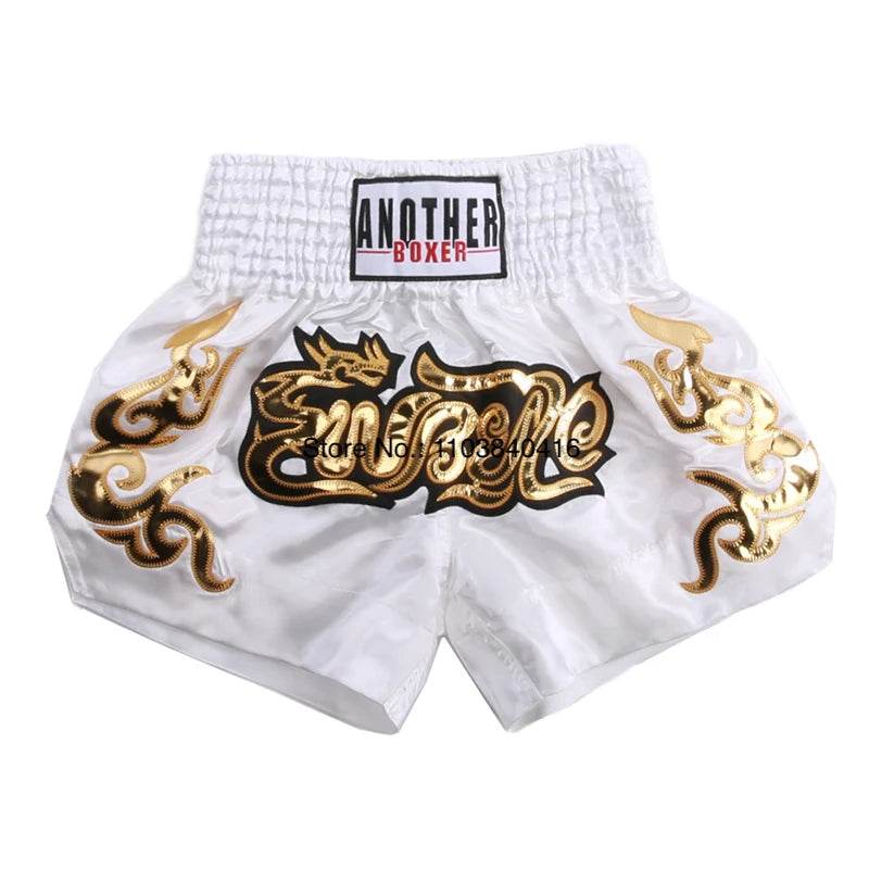 White and gold satin kickboxing trunks for men and women with embroidered dragon and wide elastic waistband