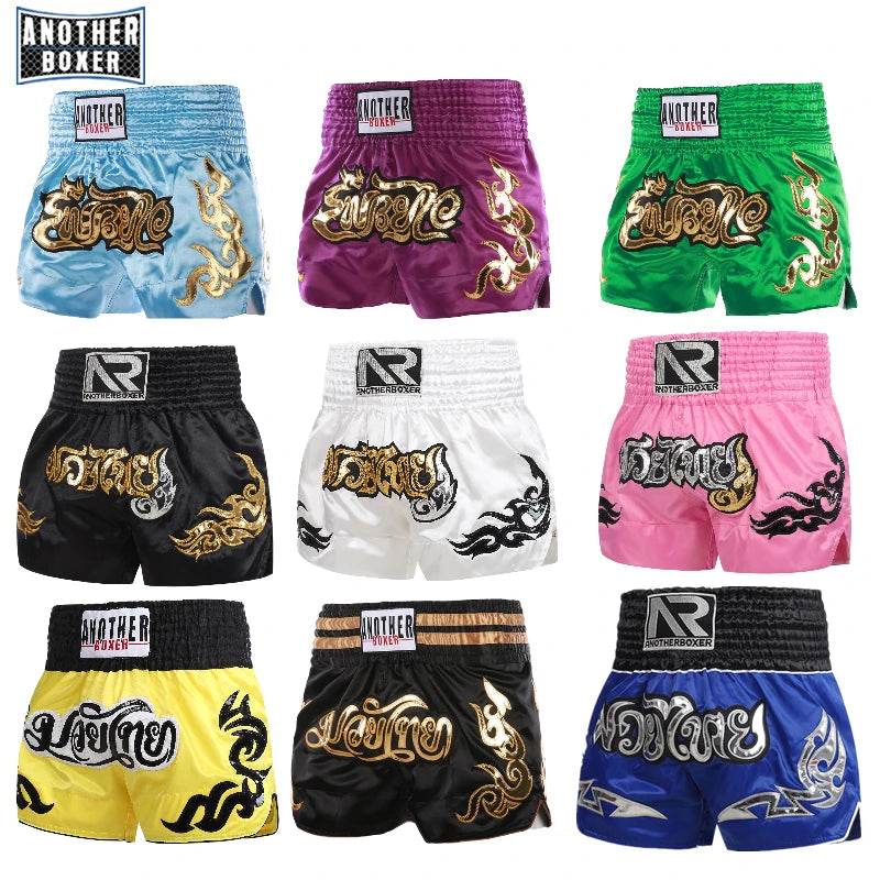 Muay Thai shorts unisex multicolor grid of nine pairs with elastic waist embroidered gold Thai designs by Thai Blessing Co
