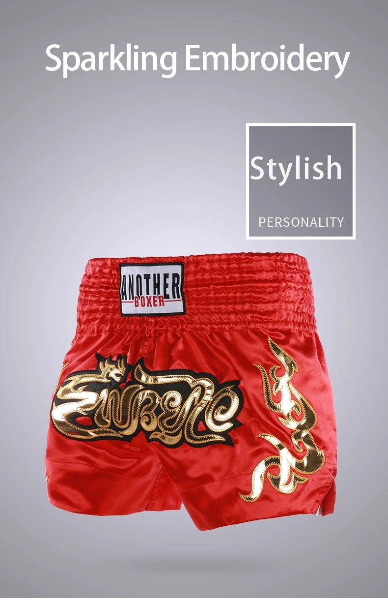 Red Muay Thai shorts unisex with gold sparkling embroidery and high elastic waistband for training and competition
