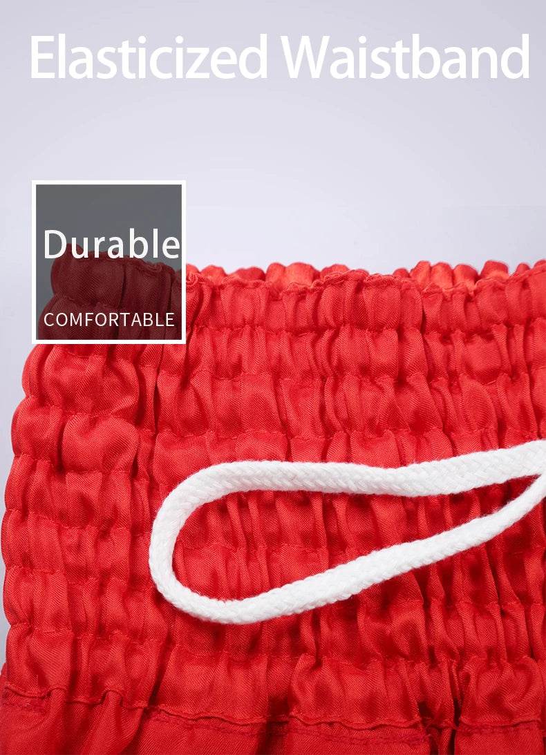 Close up of red elasticized waistband with white drawstring on Muay Thai shorts unisex showing durable comfortable fabric