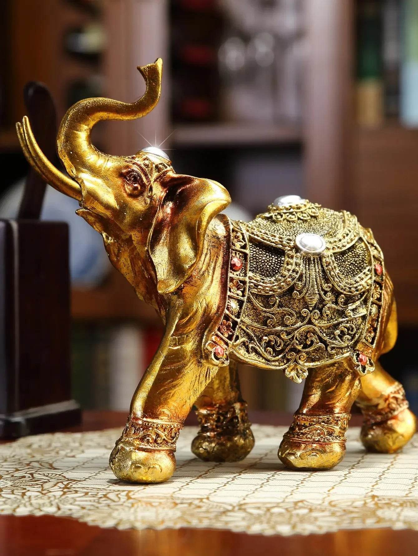 Handcrafted Elephant Sculpture - Elegant Gold Decor for Home and Office