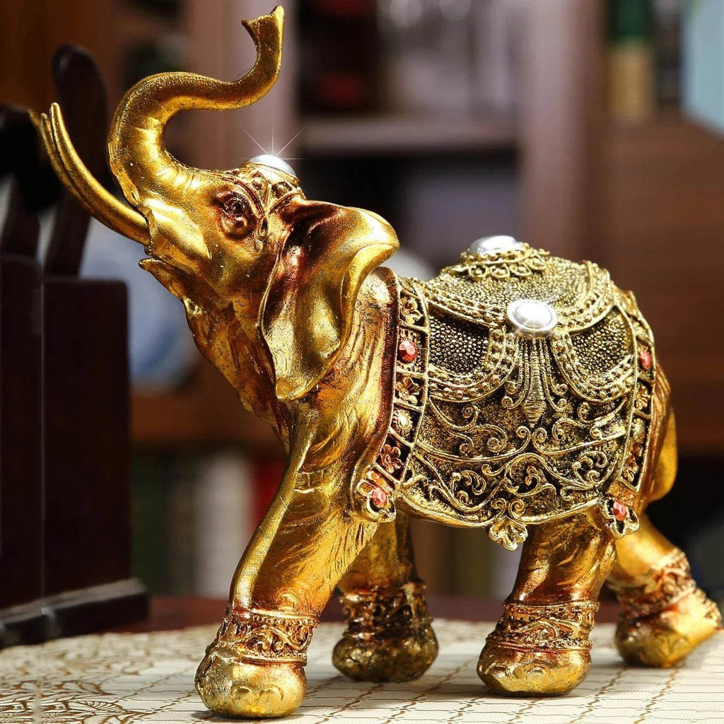 Handcrafted Elephant Sculpture - Elegant Gold Decor for Home and Office