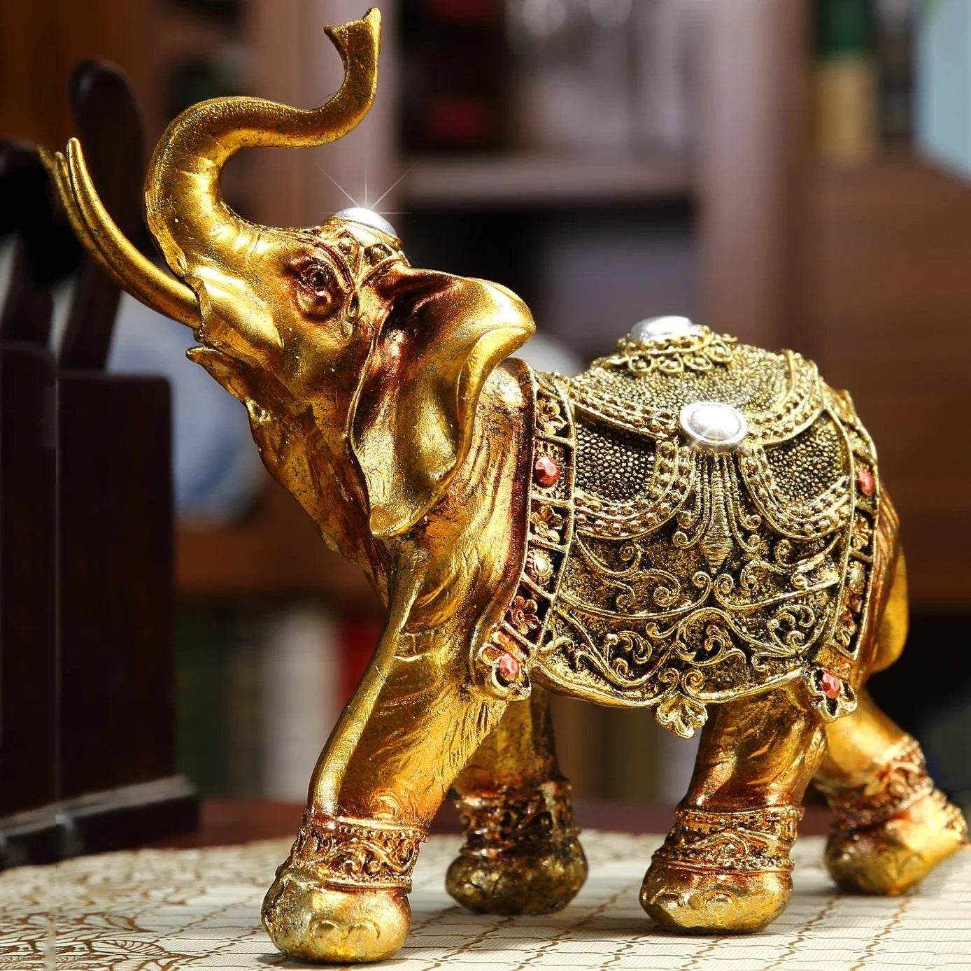 Handcrafted Elephant Sculpture - Elegant Gold Decor for Home and Office