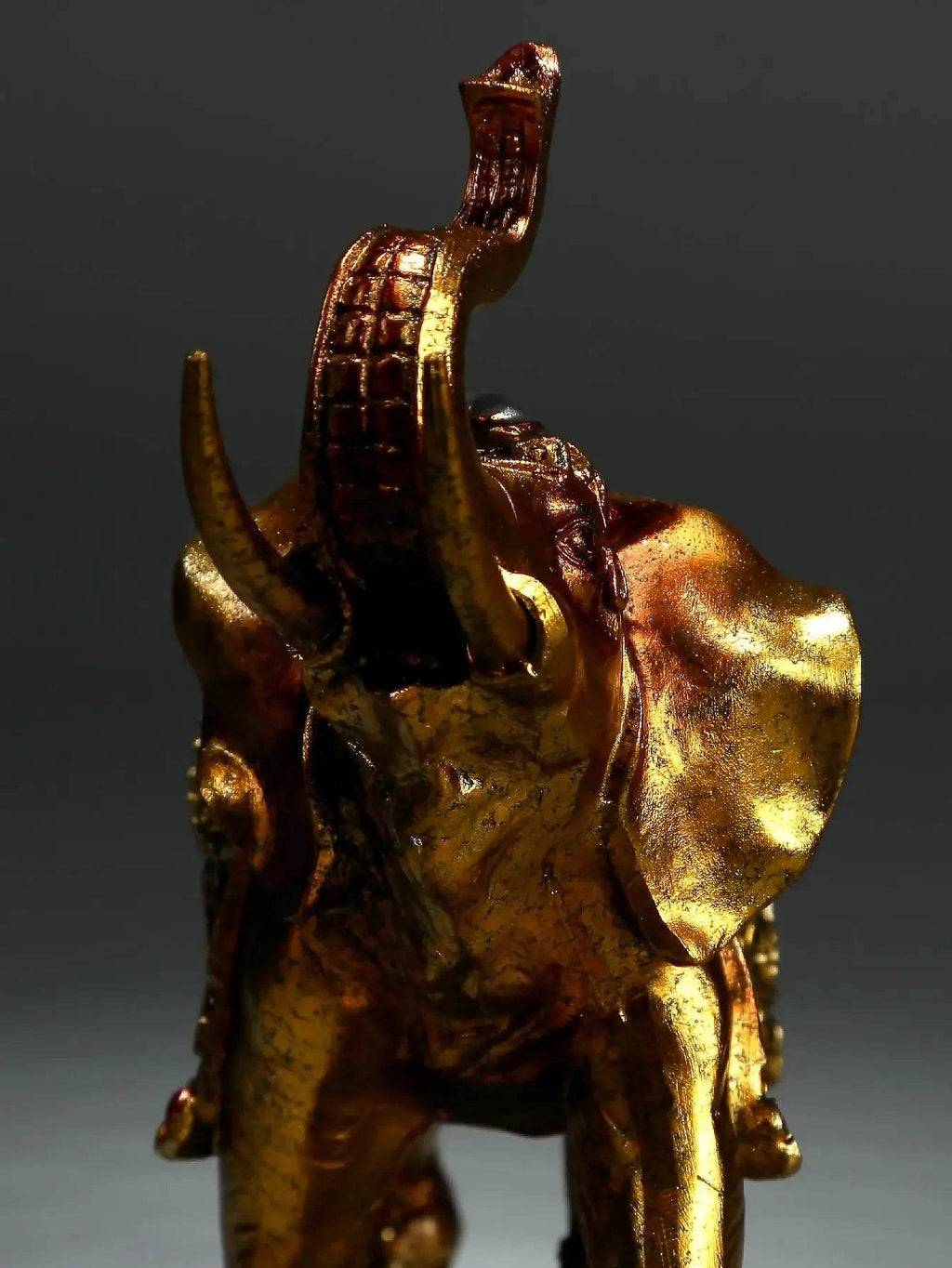 Handcrafted Elephant Sculpture - Elegant Gold Decor for Home and Office