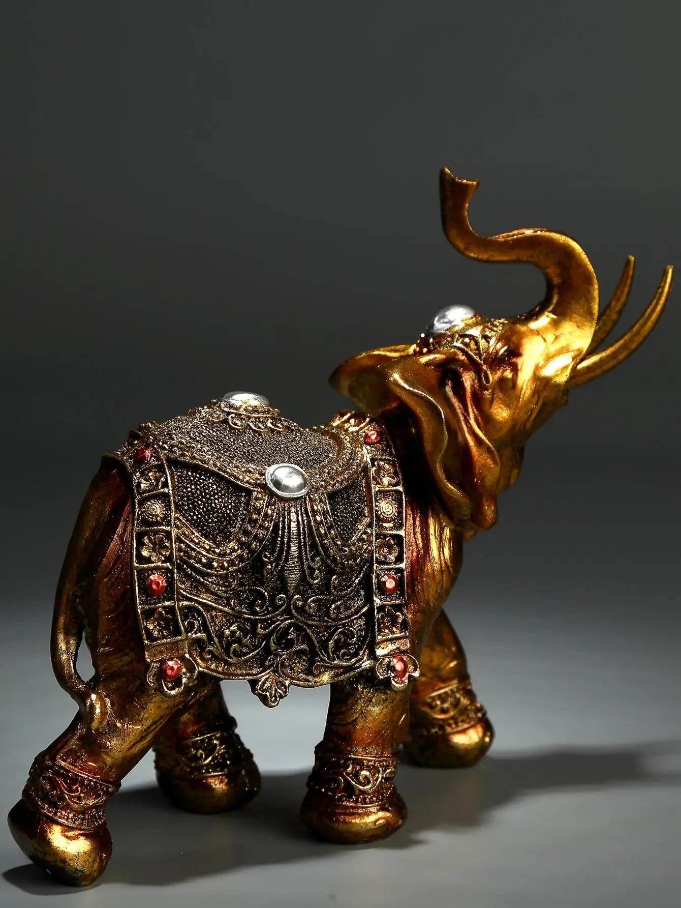 Handcrafted Elephant Sculpture - Elegant Gold Decor for Home and Office