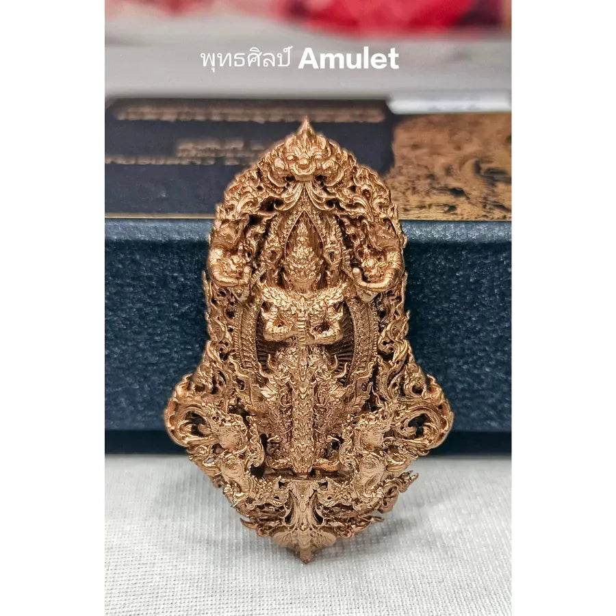 Intricately detailed golden authentic Thai blessed amulet with traditional spiritual design