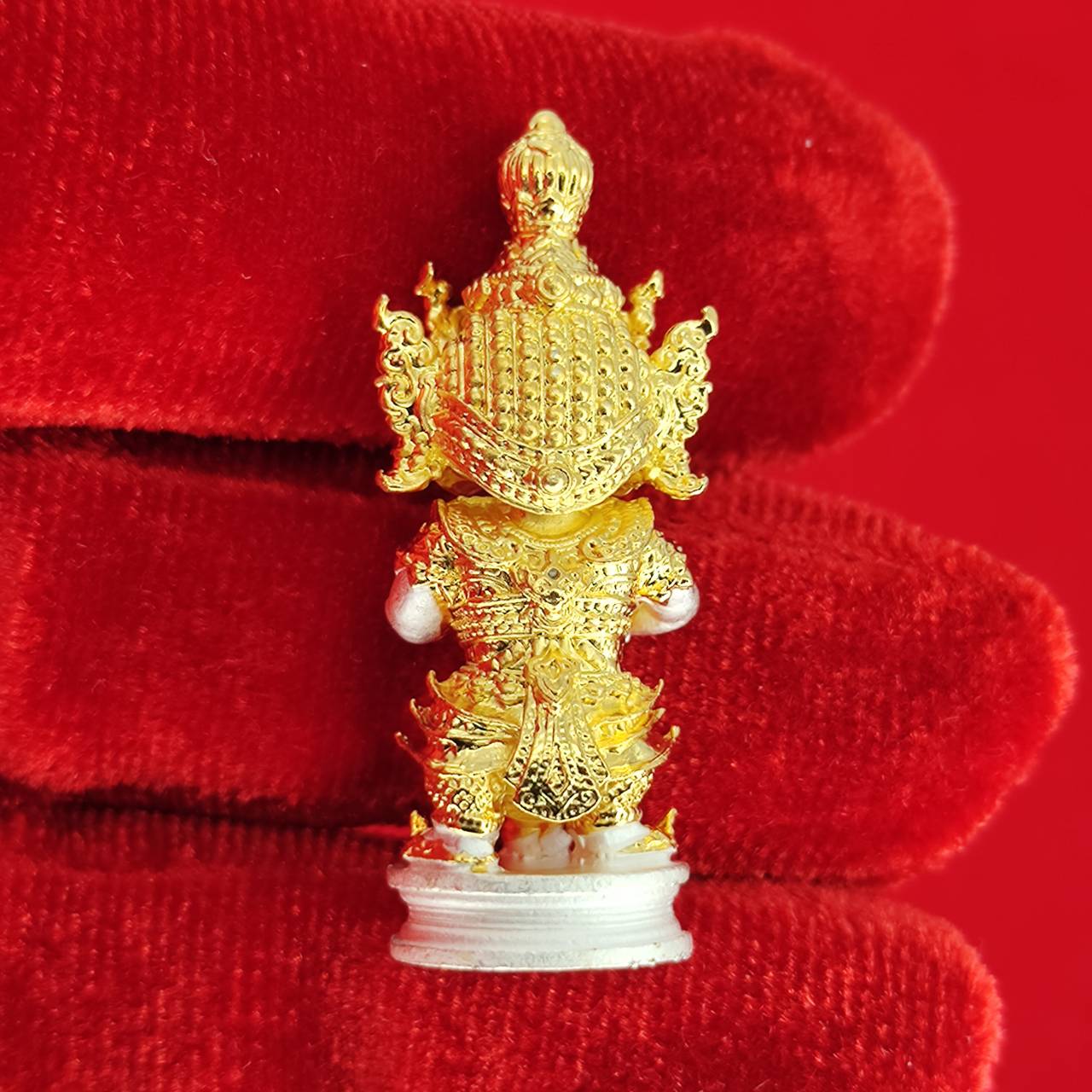 Authentic Thai protective amulet intricately designed with gold details for spiritual protection