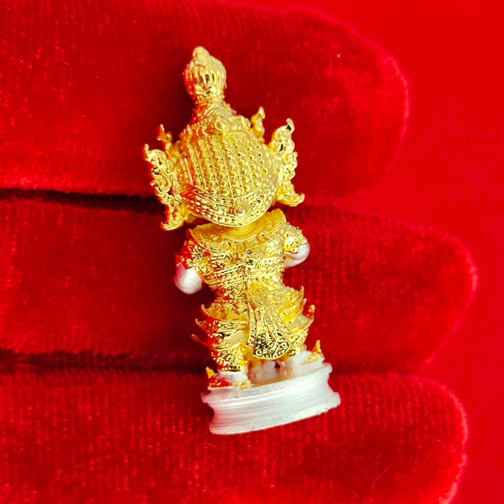 Authentic Thai protective amulet in gold finish showing intricate detailing and craftsmanship