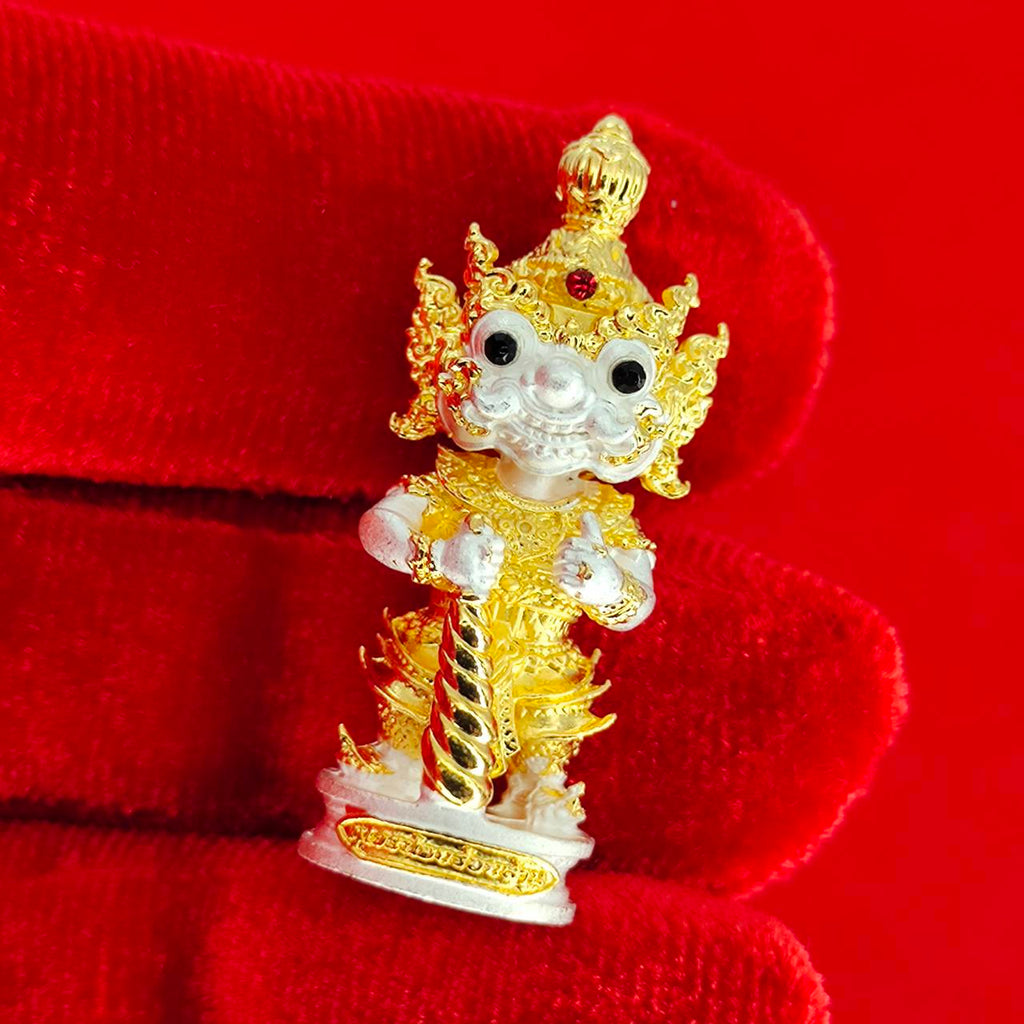 Authentic Thai protective amulet handcrafted in gold and silver with intricate details for spiritual protection