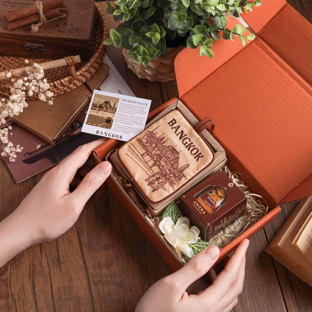Bangkok herbal gift set with wooden box and aromatic oil in an open orange gift box