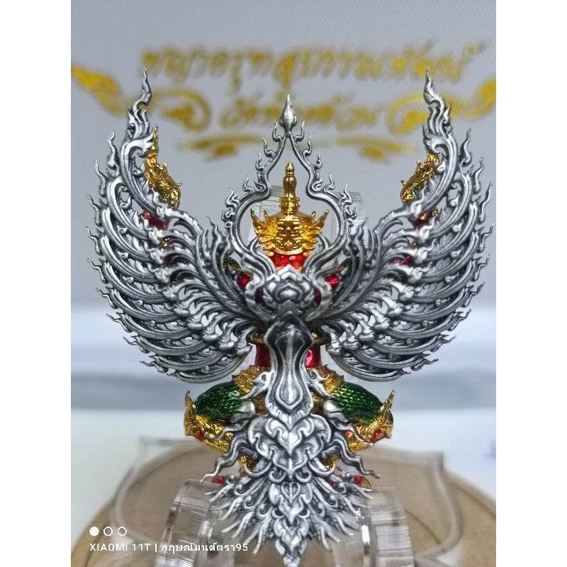 Intricate blessed Thai talisman for wealth with silver wings and gold crown from Thai Blessing Co