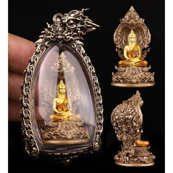 Buddhist protection amulet Thailand featuring a golden Buddha statue in ornate casing