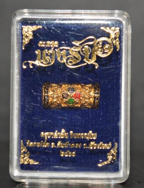 Gold Thai talisman with colorful gems for charm and attraction Thai talisman decorating your home
