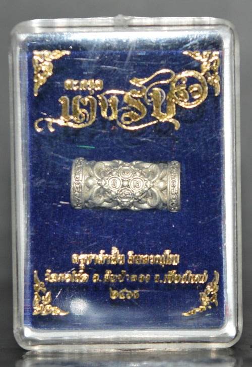 Charm and attraction Thai talisman in decorative packaging for spiritual and decorative use