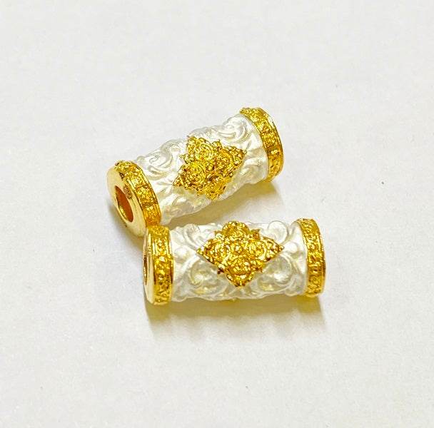 Two decorative Thai talisman beads with golden accents for charm and attraction Thai talisman
