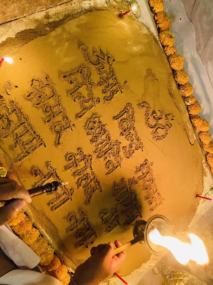 Ceremonial ritual for a cleanse negative energy Thai amulet with offerings and sacred inscriptions