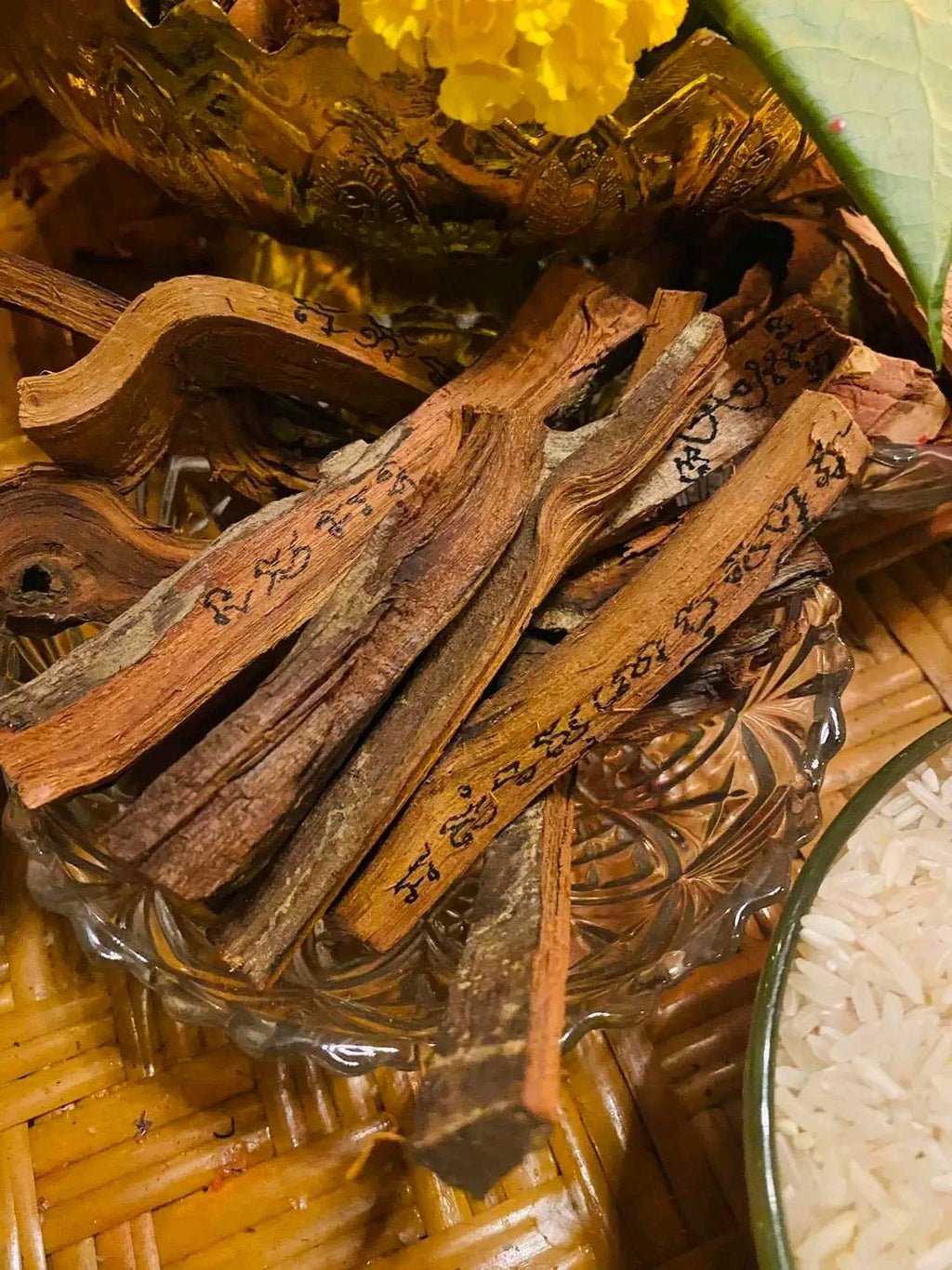 Assorted Thai amulet herbal sticks for cleanse negative energy Thai amulet on a decorative plate