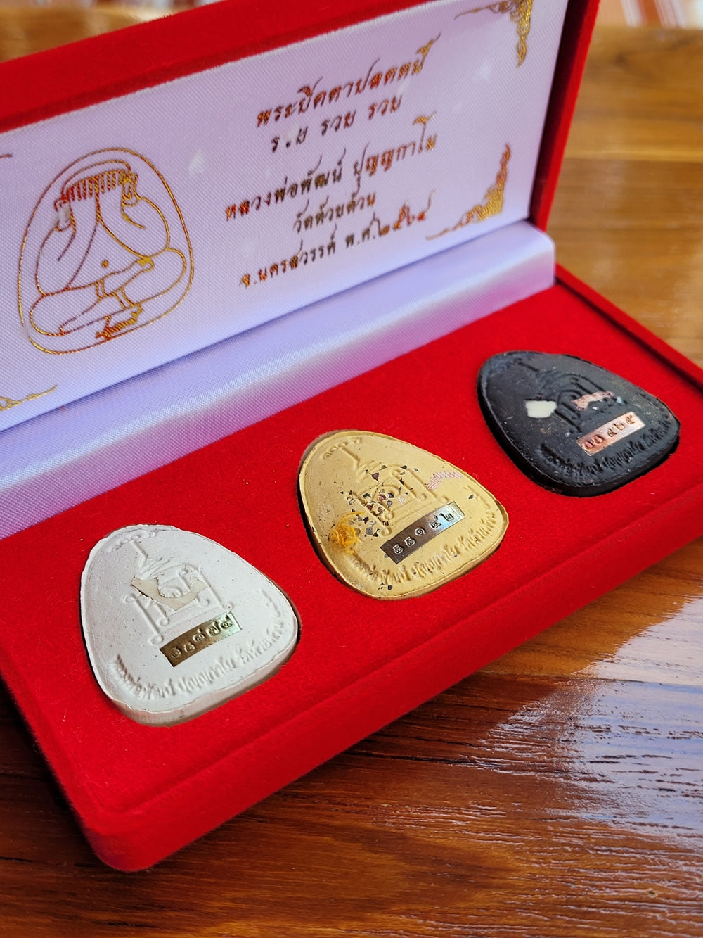 Phra Pidta Amulet for Financial Freedom - Clear Your Debts and Achieve Wealth with the Legendary 'Plot Nee Ruay Ruay Ruay' by LP Phat