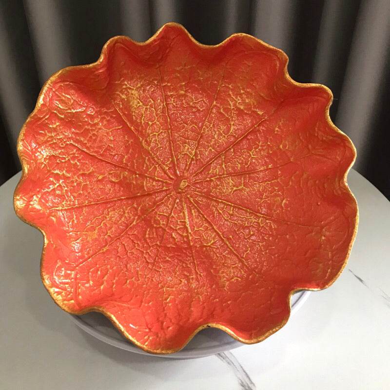 Decorative natural resin bowl 20cm in vibrant orange with gold accents and textured leaf design