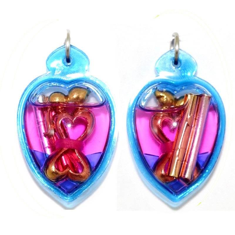 Dual Charm Thai Love Pendant - Elegant Twin Figures in Herbal Oil Casing | 泰式双人魅力吊坠 - 植物精油封装的双体工艺饰品