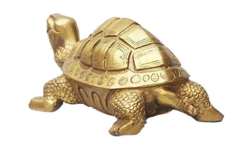 Gold-colored feng shui turtle home decor figurine with detailed shell and textured legs
