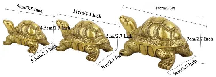 Set of three gold feng shui turtle home decor statues in small, medium, and large sizes