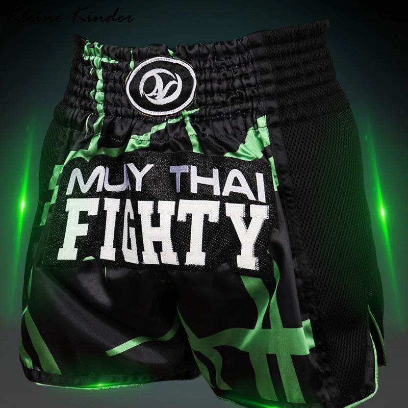 Muay Thai shorts Thailand black green elastic waist mesh side panels for training and sparring
