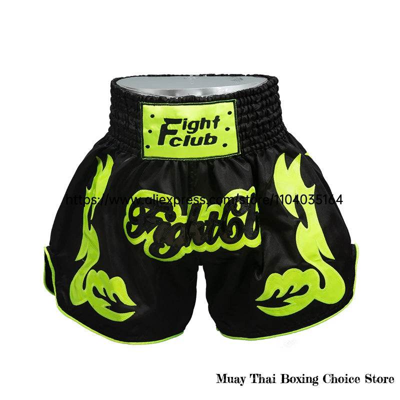 Black Muay Thai shorts Thailand with neon green flame design and Fight Club waistband logo