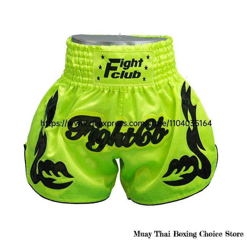 Neon green satin Muay Thai shorts Thailand with black Fight Club logo and tribal flame side designs