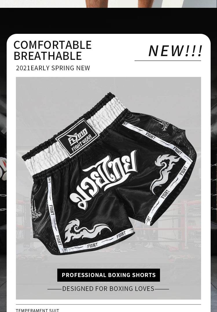 Black and white Muay Thai boxing shorts with Thai script elastic waistband and wave details