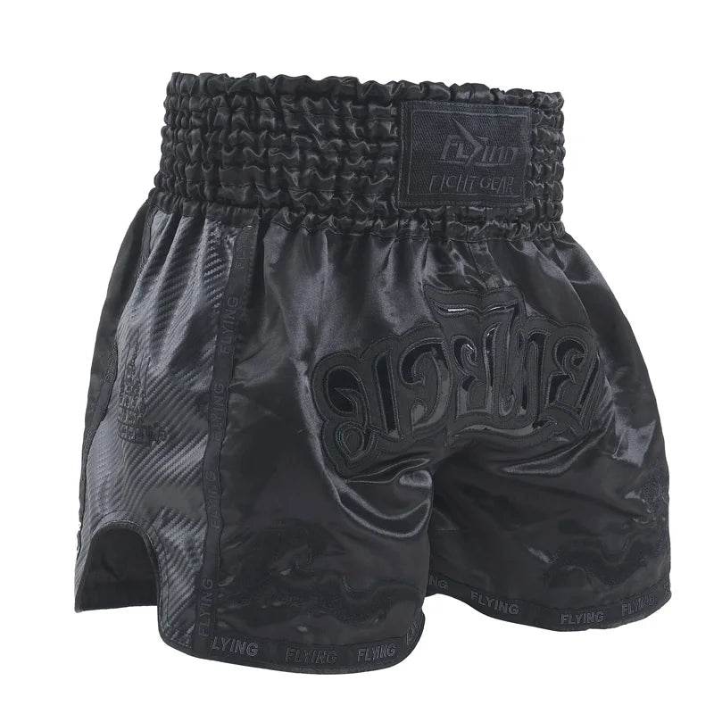 Muay Thai boxing shorts black satin with high elastic waistband side slits for mobility
