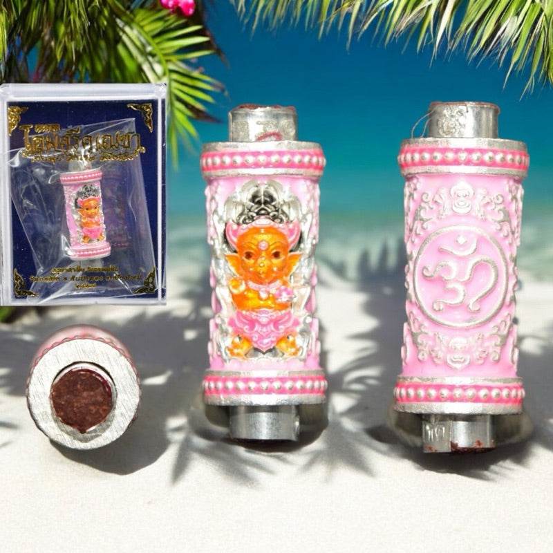 Ganesha Takrut amulet Thailand in pink and silver design, ideal for home decor and spiritual practice