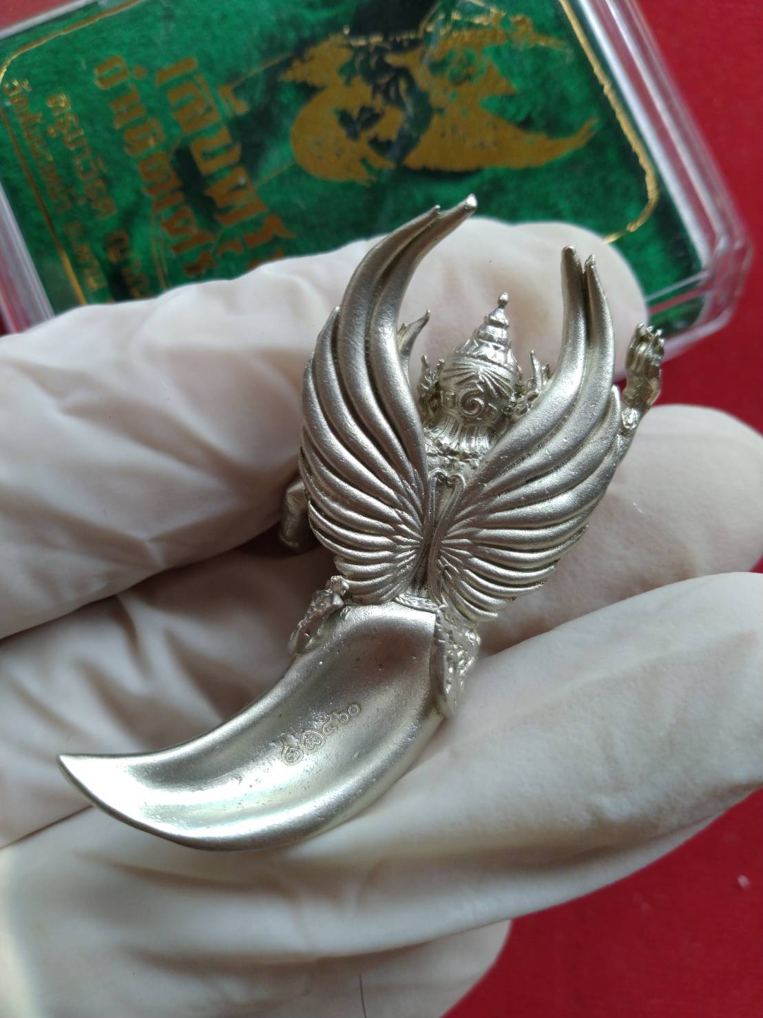 Garuda claw pendant blessed by Kruba Virut showcasing intricate wing design and craftsmanship
