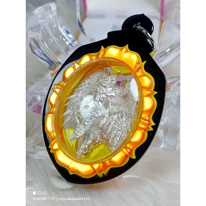 Garuda Parameswara amulet with silver figure in gold and black casing from Thai Blessing Co