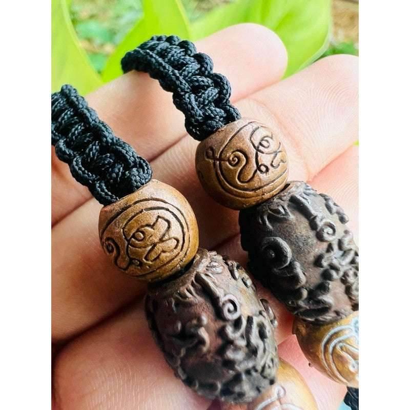 Ghost Amulet Bracelet – Maha Bhuti Yantra Scroll with Adjustable Wax Rope Cord by Phor Than Jarun, Wat Khao Muang Kao